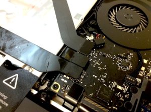 Logic board with coffee stains